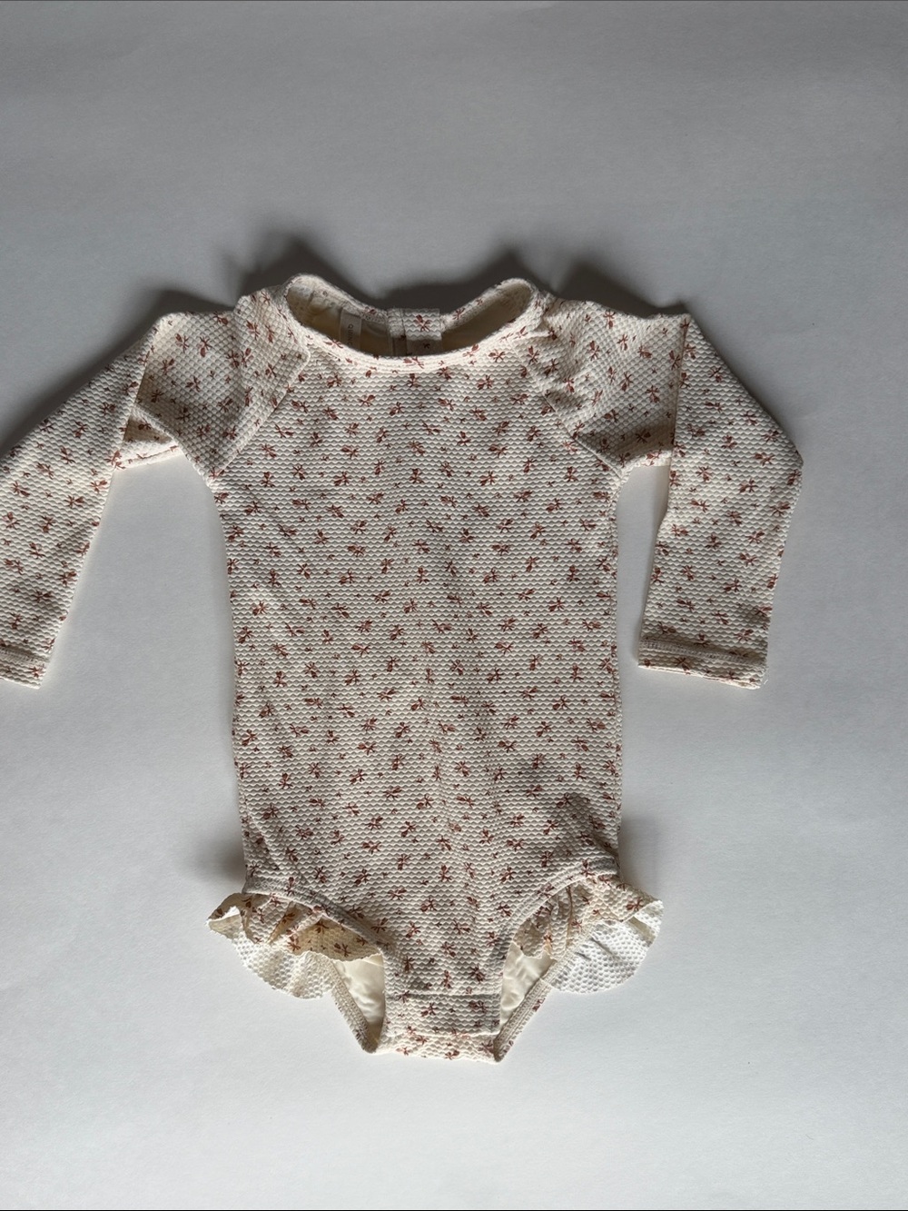 Quincy Mae UPF 50+ Cream Long-Sleeve Floral Swim One-Piece with ruffle detail